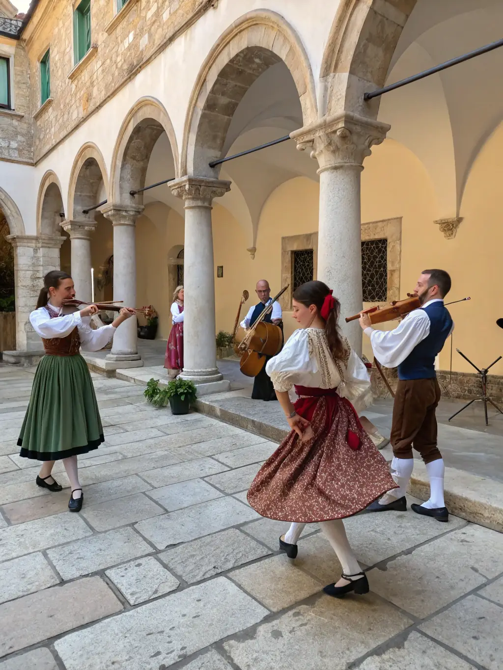 A festive image of a cultural celebration at L'HEUR DE LIRE, featuring traditional music, dance, and food from a specific culture.